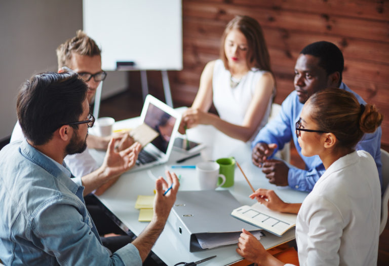 Group of multi-ethnic business partners discussing ideas